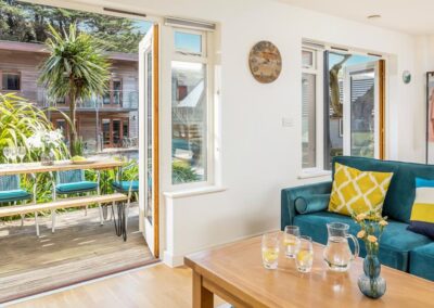 Open plan living area and outside seating area at Trelawney